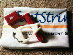 Littleton Guitar School - pin puller, string winder, cloth